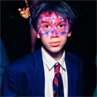 Young boy with painted face, NYC  © 2017 Keith Trumbo