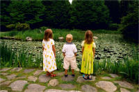 Three children by pond, NY  © 2017 Keith Trumbo