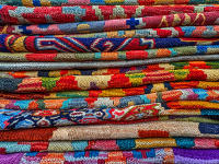 Rainbow of rugs, Paris © 2024 Keith Trumbo
