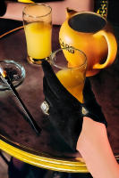 Gloved hand with an apéritif © 2019 Keith Trumbo