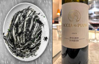 Wine and Risotto Nero, cuttlefish in ink and gremolata, Bocca Di Lupo, London © 2023 Keith Trumbo